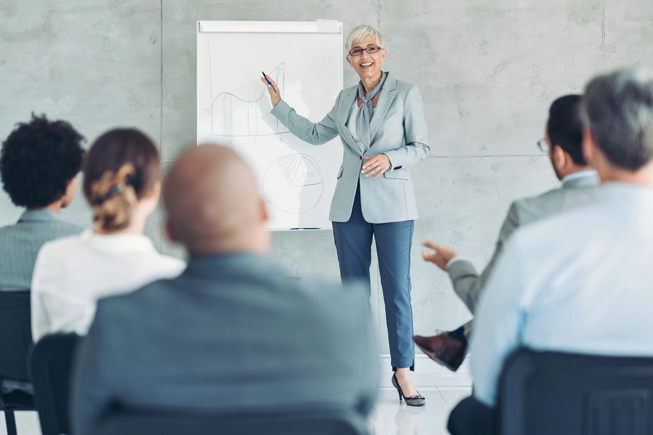Facilitator leading a strategy discussion with a group