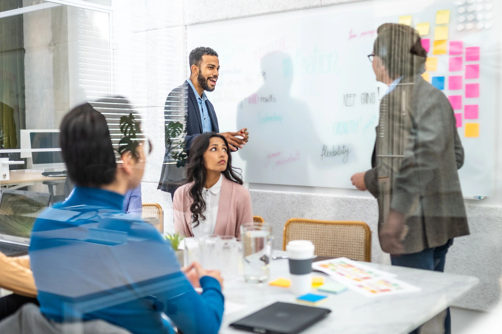 Team collaborating on a project plan with sticky notes
